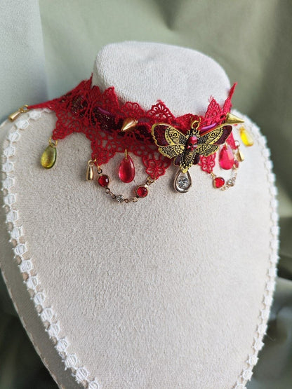 Close-up of Scarlet Metamorphosis handmade red butterfly gothic choker details