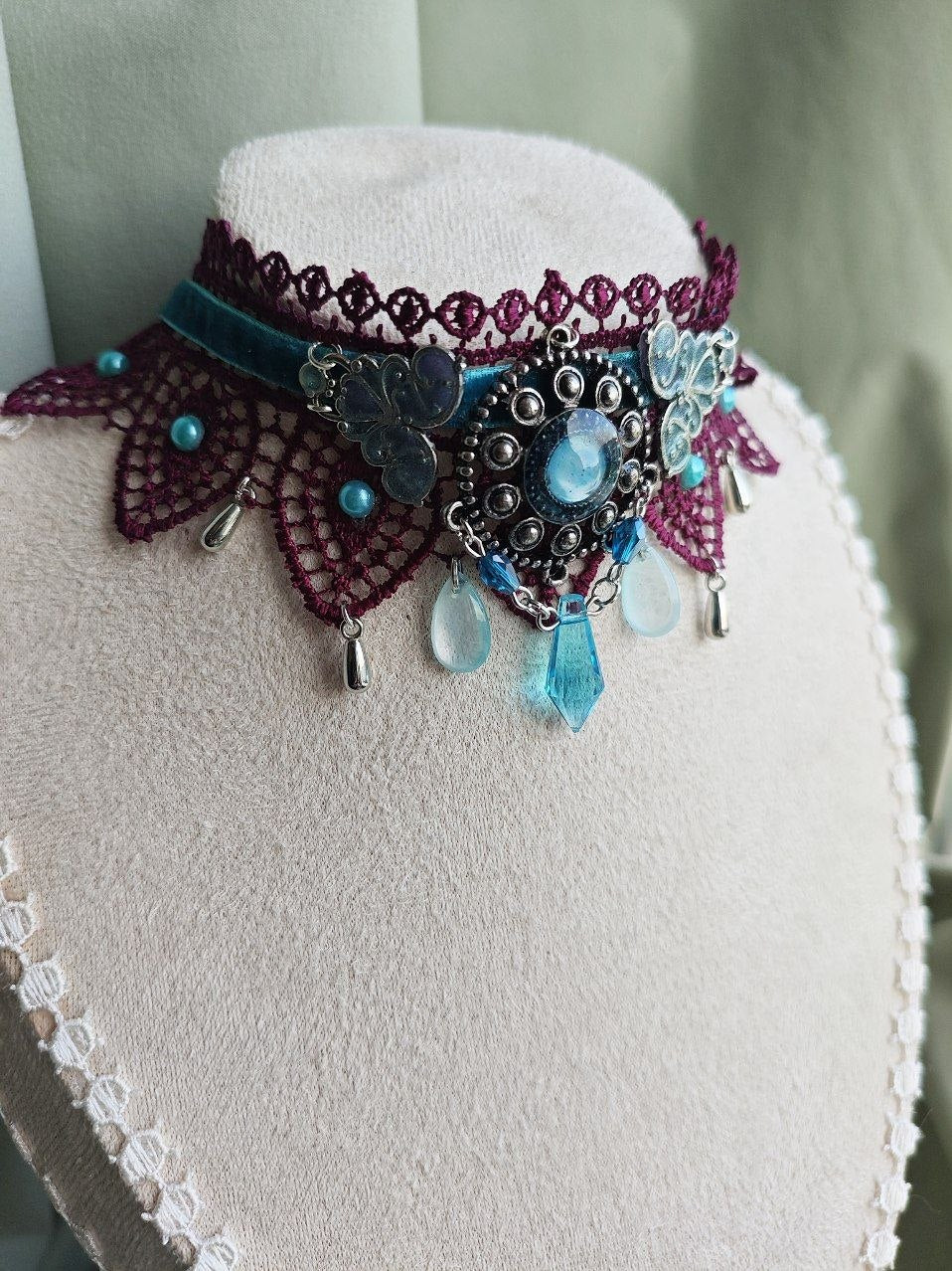 Close-up of Celestial Tide handmade blue celestial lace choker details