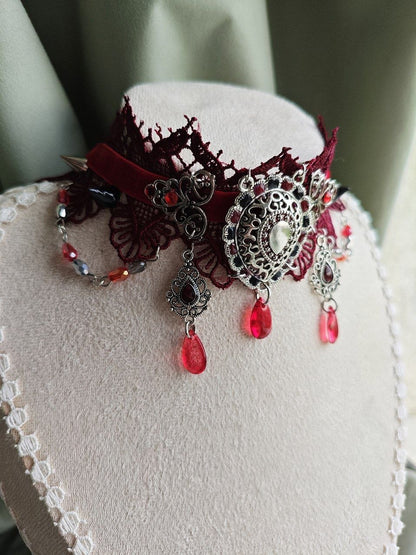 Close-up of Crimson Carnage handmade red and silver gothic statement choker details
