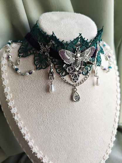 Close-up of The Necromancer's Keepsake handmade purple and green witchcore choker details