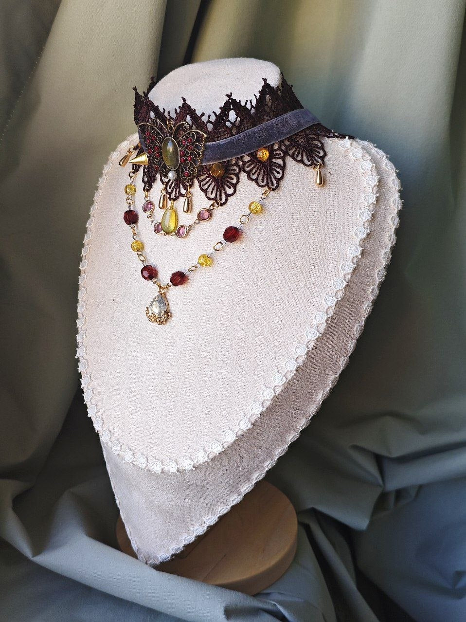 Angled view of Twilight Metamorphosis dark romantic butterfly statement choker